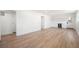 Finished basement area with light floors, a kitchenette, and exterior access at 380 Atwood Nw Dr, Marietta, GA 30064