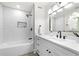 Modern bathroom with subway tile shower, sleek vanity, and contemporary fixtures at 380 Atwood Nw Dr, Marietta, GA 30064