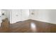 Spacious bedroom with hardwood floors, white walls and trim, and an exterior view at 380 Atwood Nw Dr, Marietta, GA 30064