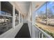 Relaxing covered porch offers a peaceful outdoor space with views of the surrounding neighborhood at 380 Atwood Nw Dr, Marietta, GA 30064