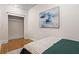 Neutral bedroom with natural light, a cozy bed, and minimalist decor at 242 12Th Ne St # 14, Atlanta, GA 30309