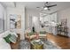 Inviting living room with hardwood floors, neutral walls, and open access to the kitchen at 242 12Th Ne St # 14, Atlanta, GA 30309