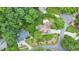 A high angle view showing the placement of the home in the cul-de-sac, among mature trees and landscaping at 915 Chipley Ct, Marietta, GA 30062