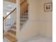 Finished basement featuring wooden stairs with black railings at 915 Chipley Ct, Marietta, GA 30062
