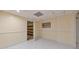Neutral basement with tiled floors and framed picture on the wall at 915 Chipley Ct, Marietta, GA 30062