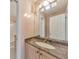 Bathroom featuring granite countertops, a large mirror, and an ensuite at 915 Chipley Ct, Marietta, GA 30062