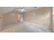 Large bedroom featuring carpet, natural light from a window, and an open door at 915 Chipley Ct, Marietta, GA 30062
