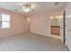 Bedroom with carpet and an attached bathroom with a great vanity and mirror at 915 Chipley Ct, Marietta, GA 30062