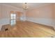 Spacious dining room features hardwood floors and decorative chandelier at 915 Chipley Ct, Marietta, GA 30062