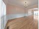 Bright dining room with hardwood floors, chandelier, and large windows at 915 Chipley Ct, Marietta, GA 30062