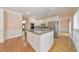Open kitchen with island, stainless steel appliances, and plenty of counter space at 915 Chipley Ct, Marietta, GA 30062