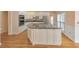 Kitchen features a large island with granite countertop and stainless appliances at 915 Chipley Ct, Marietta, GA 30062