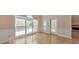 Bright living room with access to deck and features hardwood floors and fireplace at 915 Chipley Ct, Marietta, GA 30062