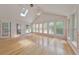 Charming sunroom with multiple windows and a vaulted ceiling at 915 Chipley Ct, Marietta, GA 30062