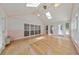 Inviting sunroom features a vaulted ceiling, skylights, and multiple windows at 915 Chipley Ct, Marietta, GA 30062
