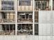 Condo building featuring units with individual balconies and a vintage design at 145 15Th Ne St # 409, Atlanta, GA 30309