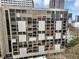 Full building shot featuring a vintage building featuring balconies and many windows at 145 15Th Ne St # 409, Atlanta, GA 30309