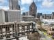 Beautiful city view showcasing the condo in a vibrant metropolitan area at 145 15Th Ne St # 409, Atlanta, GA 30309