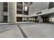 Well-maintained building entrance and drive offering covered parking and easy access at 145 15Th Ne St # 409, Atlanta, GA 30309
