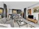 Bright living room with marble floors, modern decor, and plentiful artwork on display at 145 15Th Ne St # 409, Atlanta, GA 30309