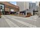 Vibrant outdoor plaza with seating, dining, and entertainment spaces in a commercial area at 145 15Th Ne St # 409, Atlanta, GA 30309
