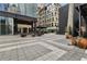Chic outdoor seating area outside shops and restaurants with contemporary design at 145 15Th Ne St # 409, Atlanta, GA 30309