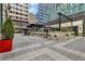 Outdoor seating with umbrellas and landscaping enhance the commercial space at 145 15Th Ne St # 409, Atlanta, GA 30309