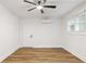Bright, spacious living room with ceiling fan, and wood-look flooring at 1927 Willa Way, Decatur, GA 30032
