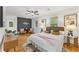 Bright main bedroom with hardwood floors, white walls, and a geometric feature wall at 1927 Willa Way, Decatur, GA 30032