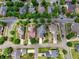 An aerial view of a neighborhood showcases well-maintained homes and lush greenery, with orderly streetscapes at 207 Harmony Lake Dr, Canton, GA 30115