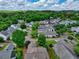 Neighborhood aerial view displaying the tree-lined streets, well-maintained landscaping, and community layout at 207 Harmony Lake Dr, Canton, GA 30115