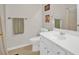 Bathroom featuring a single sink vanity, a toilet, and a shower at 207 Harmony Lake Dr, Canton, GA 30115