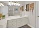 Bright bathroom featuring double sink vanity with ample counter space and storage at 207 Harmony Lake Dr, Canton, GA 30115
