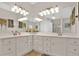Bright bathroom featuring double sink vanity with ample counter space and storage at 207 Harmony Lake Dr, Canton, GA 30115