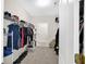 Walk-in closet featuring wire shelving and rod system for easy organization at 207 Harmony Lake Dr, Canton, GA 30115