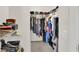 Walk-in closet featuring wire shelving and rod system for easy organization at 207 Harmony Lake Dr, Canton, GA 30115