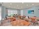 Conference room featuring tables and chairs with a wall-mounted TV at 207 Harmony Lake Dr, Canton, GA 30115