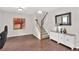 Entryway featuring hardwood floors, a staircase, and a console table at 207 Harmony Lake Dr, Canton, GA 30115