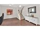 Entryway featuring hardwood flooring, staircase, and decorative furnishings at 207 Harmony Lake Dr, Canton, GA 30115