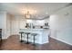 Spacious kitchen featuring a central island with seating and modern stainless steel appliances at 207 Harmony Lake Dr, Canton, GA 30115