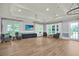 Bright room with large windows, comfortable seating, and modern decor at 207 Harmony Lake Dr, Canton, GA 30115