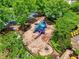 A colorful playground nestled amidst trees offers a fun and safe recreational space at 207 Harmony Lake Dr, Canton, GA 30115