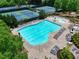 Aerial view of the pool area showcasing recreational water features and neatly organized lounge seating at 207 Harmony Lake Dr, Canton, GA 30115