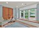 Cozy sitting area with a window seat, comfortable chairs, and ample natural light at 207 Harmony Lake Dr, Canton, GA 30115