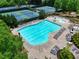 Large community pool perfect for summer fun, complete with lounge chairs and a kiddie splash area at 207 Harmony Lake Dr, Canton, GA 30115