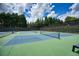 Well-maintained tennis courts with professional surfacing and netting, ideal for sports enthusiasts at 207 Harmony Lake Dr, Canton, GA 30115