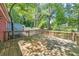 Expansive wooden deck perfect for outdoor entertaining amidst lush greenery at 350 Pleasant Oak Sw Ct, Marietta, GA 30008