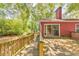 Backyard wooden deck with a picturesque view of the green surroundings at 350 Pleasant Oak Sw Ct, Marietta, GA 30008
