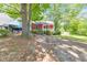 Cozy home exterior, inviting entrance, and natural landscape at 350 Pleasant Oak Sw Ct, Marietta, GA 30008