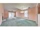 Spacious living room with vaulted ceilings, fireplace, and access to outdoor deck through sliding glass doors at 350 Pleasant Oak Sw Ct, Marietta, GA 30008